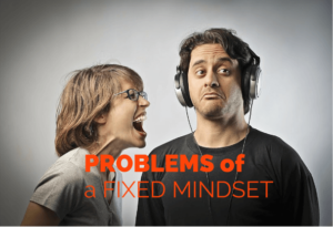 A woman is screaming at man but he is wearing headphones and doesn't hear her. The text reads "problems of a fixed mindset"